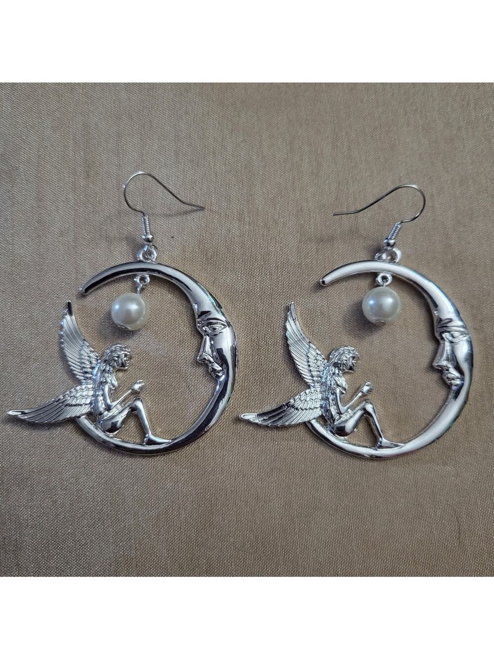 Fairy sitting on crescent moon with faux pearl earrings